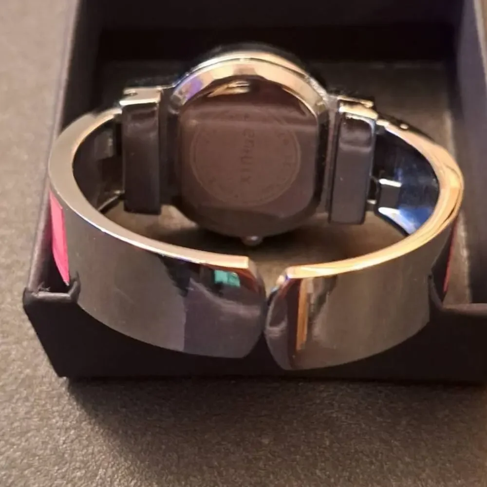Girls Pink Character Bangle Quartz Stainless Steel Wristwatch